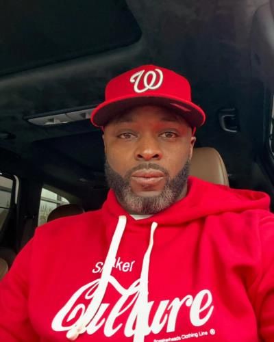 Reggie Wayne Exudes Confidence In Bold Red Outfit Choice