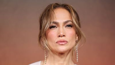 Jennifer Lopez shows us how elevate denim with a tweed blazer and designer handbag