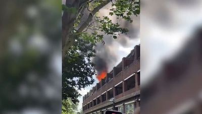 Hackney fire: Residents flee as huge blaze breaks out at block of flats with 100 firefighters battling flames