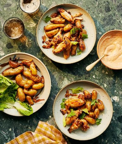 Honey & Co’s air-fryer chicken wings with baby potatoes – recipe