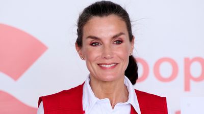 Queen Letizia's high ponytail with genius wrap around detail and striking rosy eye has got us taking notes