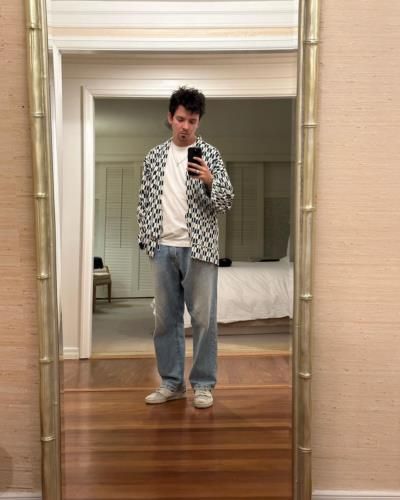 Asa Butterfield's Casual Cool: A Stylish Mirror Selfie Moment