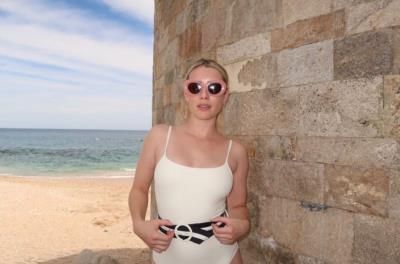 Emma Roberts Radiates Confidence In Stylish Beach Attire