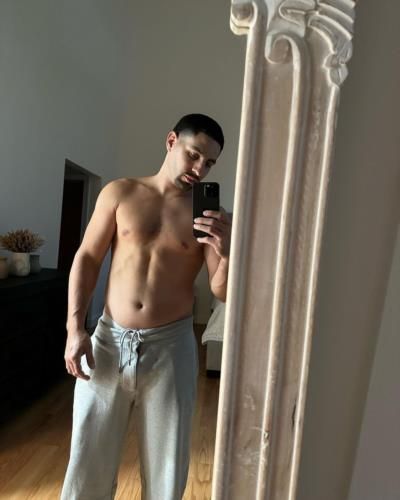 Danny Garcia's Confident And Stylish Mirror Selfie