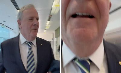 Airport CCTV footage could show what happened between Peter Costello and News Corp journalist