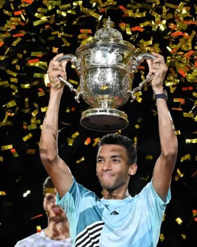 Felix Auger-Aliassime Celebrates Victory With Trophy And Confetti