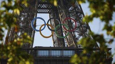 Olympic rings mounted on Eiffel Tower with 50 days to go until Paris Games
