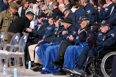 At D-Day ceremony, American veteran hugs Ukraine's Zelenskyy and calls him a savior