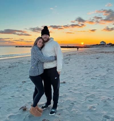 Romantic Beach Sunset Captures Love And Togetherness Of Couple