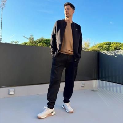 Robert Lewandowski's Stylish Black And White Ensemble