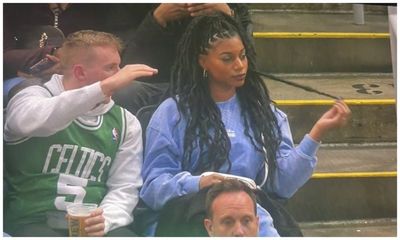 A viral photo of Taylor Rooks and a Boston Celtics fan is producing so many hysterical memes