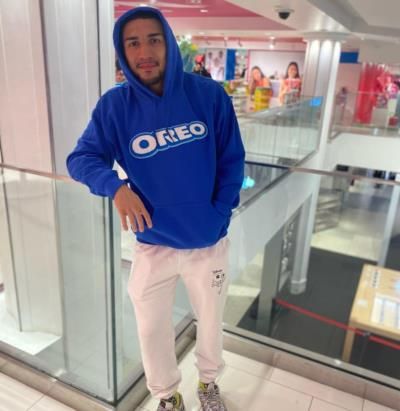 Teofimo Lopez's Stylish White Bottoms And Blue Hoodie Combo