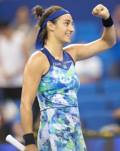 Caroline Garcia Celebrates Hard-Fought Victory On The Tennis Court