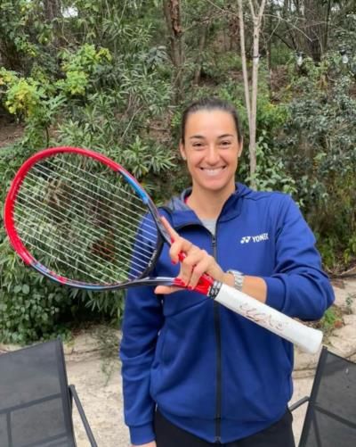 Caroline Garcia's Joyful Triumph On The Tennis Court