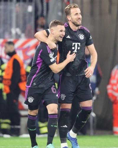 Joshua Kimmich Celebrates Victory With Teammate