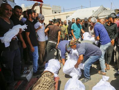 ‘Bodies scattered on streets’: Israel kills 226 in central Gaza attacks