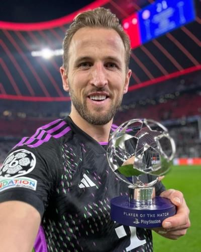 Harry Kane Celebrates Victory With Teammate In Post-Match Snapshot