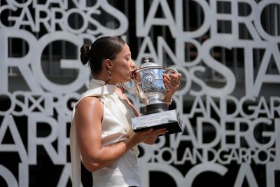 Iga Swiatek plays down chances of adding Wimbledon title to French Open crowns