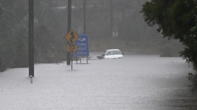 Returning river-town residents on alert as floods ease