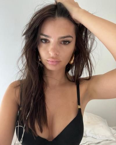 Emily Ratajkowski Stuns In Stylish Black Top, Radiating Confidence