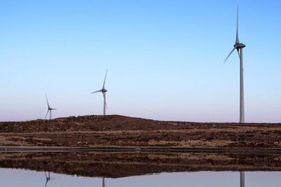 Community-owned wind farm donates £55,000 to Scottish island hospice