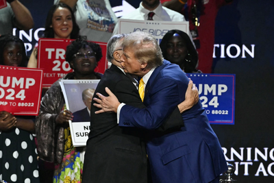 In search of Latino vote in Arizona, new Biden ad showcases Trump "kissing" controversial Arpaio