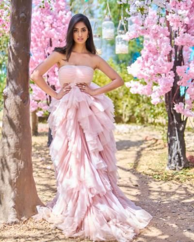 Sini Shetty Radiates Elegance In Pink Dress Amidst Flowers