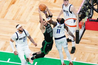 Jayson Tatum is willing to take a step back in scoring for a title