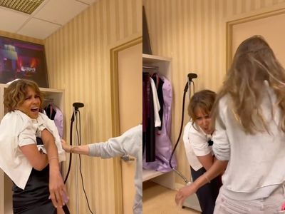 Halle Berry laughs through ‘relatable’ wardrobe malfunction as she struggles out of top with help of stylist