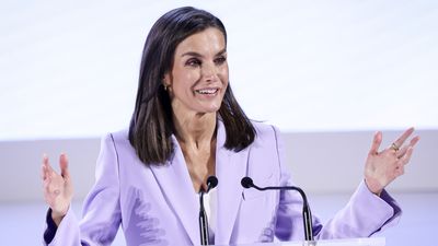 Queen Letizia's luxe lavender trouser suit with spotless trainers is ticking all our style boxes for a chic summer