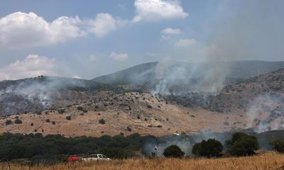 Hezbollah fires big salvo of rockets at Israel after senior commander killed