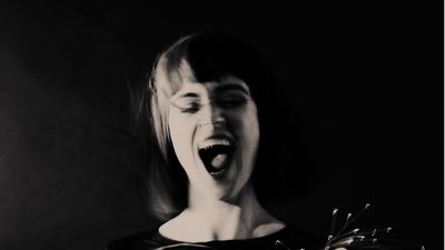 "Whether it’s scuttling, crunching, or throwing off showers of incandescent sparks, there’s a giddy, genreless joy to it all." Maverick vocalist Julie Christmas stuns on bold new album Ridiculous And Full Of Blood
