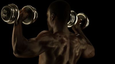 9 exercises to build swole shoulders using just dumbbells