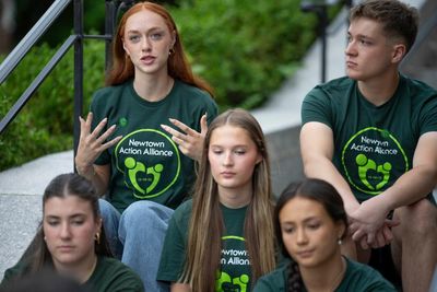 Sandy Hook survivors call for gun control as they graduate high school
