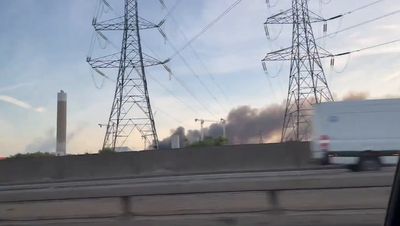 Fire rips through 500 tonnes of waste sending huge plumes of smoke over north London