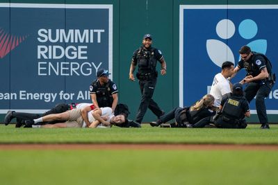 Climate protesters tackled on field at Congressional baseball game