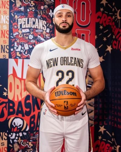 Larry Nance Jr. Poses With Basketball In Stylish White Jersey