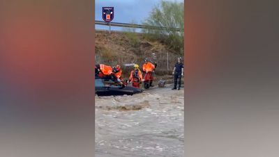 Watch: Dramatic moment trapped motorist airlifted to safety as flooding devastates Murcia in Spain