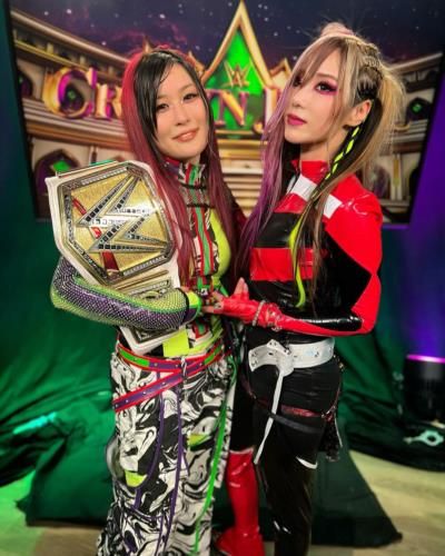 Dynamic Duo: Iyo Sky And Kairi Sane In Wrestling Attire