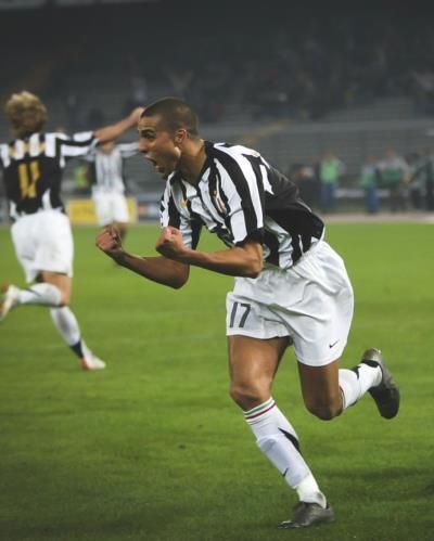 David Trezeguet Showcasing Skill And Precision In Football Match