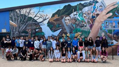 Twenty-three sets of twins graduate from single Massachusetts middle school