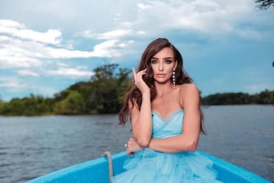 Madison Kvaltin: Serene Beauty On A Blue Boat