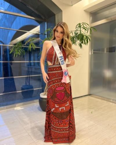 Camila Díaz Radiates Timeless Beauty And Confidence In Red Ensemble