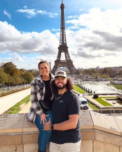 Romantic Parisian Adventure: Justin And Wife At Eiffel Tower