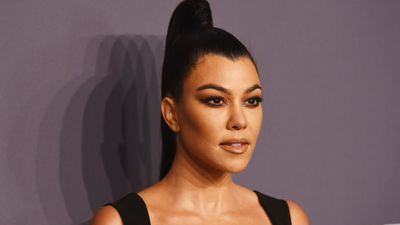 Kourtney Kardashian's oversized kitchen island is a masterclass in elevating a neutral color scheme – designers love the sculptural layout