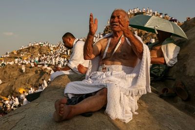 Muslim Pilgrims Pray On Mount Arafat In Hajj Climax