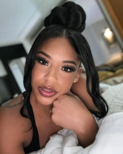 Bianca Belair Radiates Beauty And Confidence In Bed Selfie