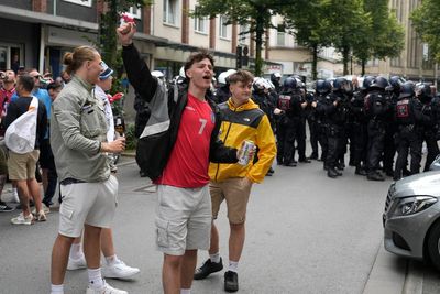 Riot police in Germany intervene to stem fan clashes ahead of England vs. Serbia soccer match