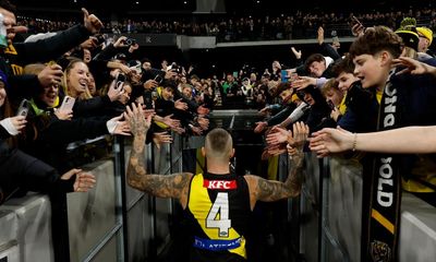 The prince of Punt Road: AFL fans rise as one for Dustin Martin’s 300th