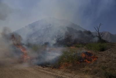 Wildfires Threaten Southern And Northern California Communities